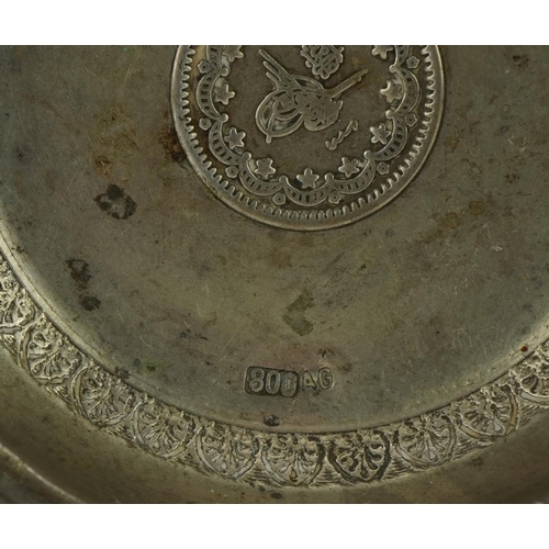 304 - Pair of Persian circular 800 grade coin set silver dishes, 7cm in diameter, 28.2g