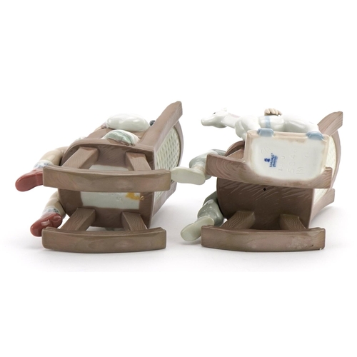 1196 - Two Lladro figures of children in rocking chairs comprising Nap Time 5448 and All Tuckered Out 5846