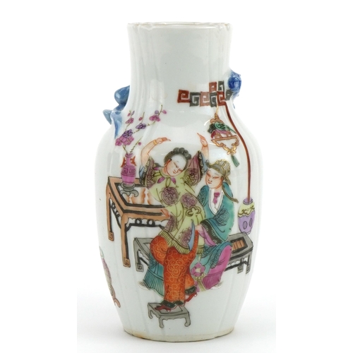 306 - Chinese porcelain vase hand painted in the famille rose palette with two figures and decorated in re... 
