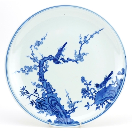 166 - Large Chinese porcelain blue and white dish hand painted with birds amongst flowers, six figure char... 
