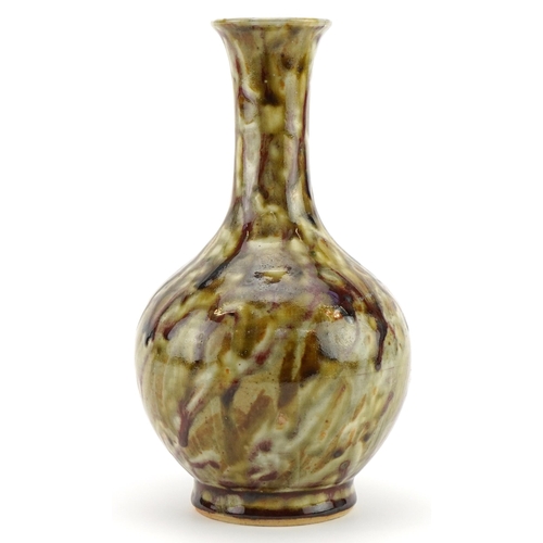 583 - Chinese porcelain vase having a red and brown glaze, 22.5cm high