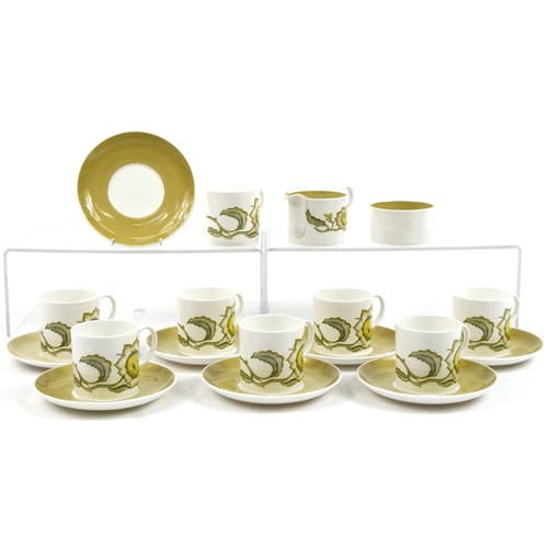 506 - Set of eight Susie Cooper Sunflower pattern cups and saucers with milk jug and sugar bowl, the sauce... 