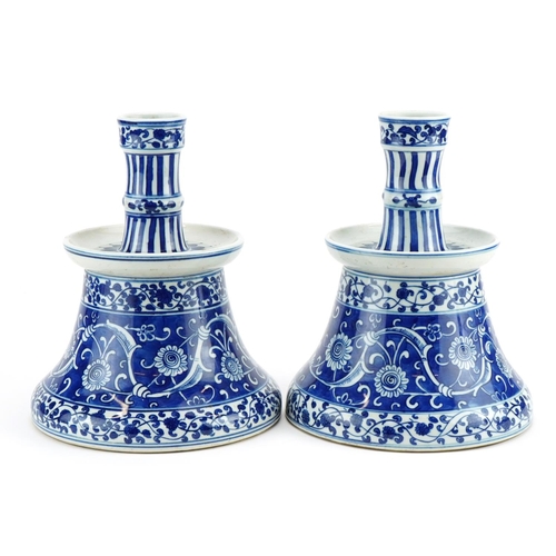 359 - Pair of Chinese Islamic porcelain hookah bases hand painted with flower heads amongst scrolling foli... 