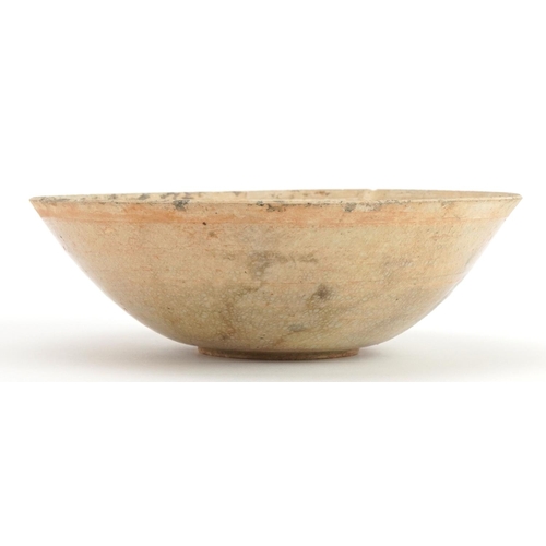 1266 - Korean celadon glazed bowl incised with fish, 17cm in diameter