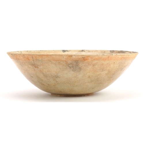 1266 - Korean celadon glazed bowl incised with fish, 17cm in diameter