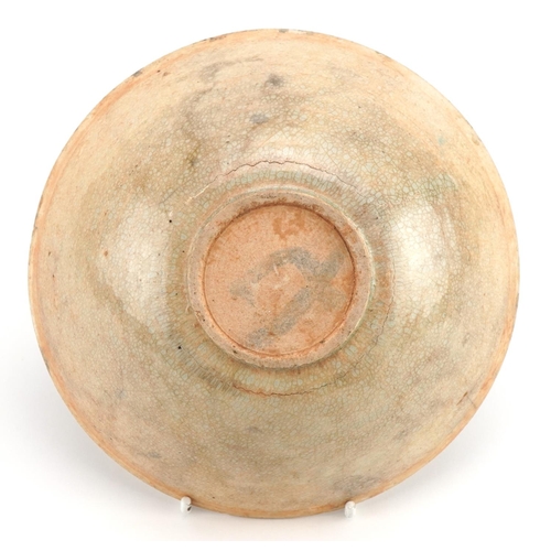 1266 - Korean celadon glazed bowl incised with fish, 17cm in diameter