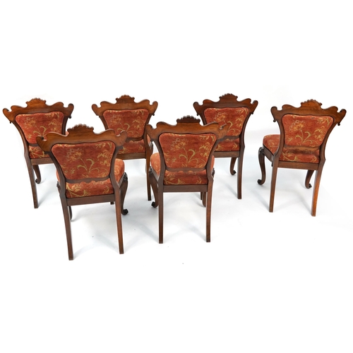 1046 - Set of six Victorian rosewood dining chairs with carved shell backs and scroll feet, 89cm high