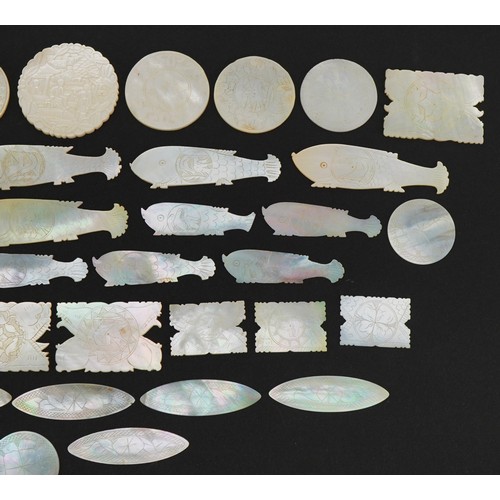 315 - Collection of Chinese Canton mother of pearl gaming tokens, some in the form of fish, the largest 6c... 