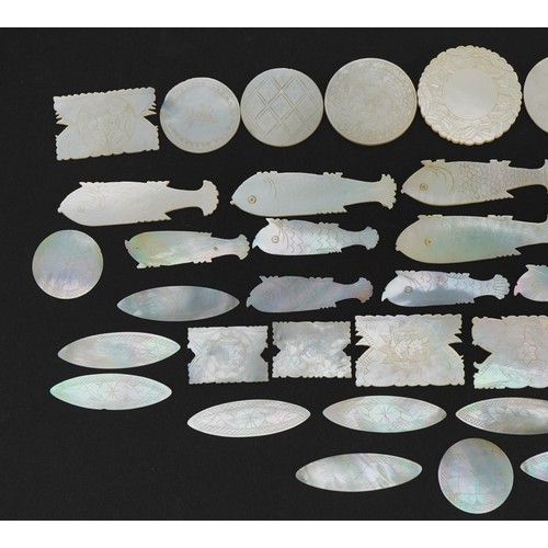 315 - Collection of Chinese Canton mother of pearl gaming tokens, some in the form of fish, the largest 6c... 