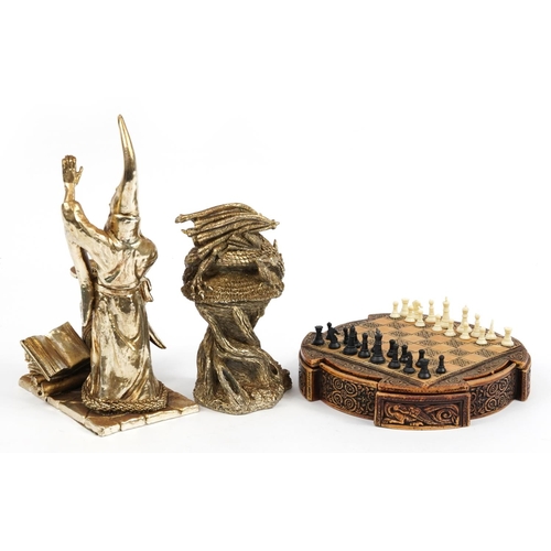 1229 - Celtic design chess board with pieces and two silvered Myth & Magic style figures, the largest 28cm ... 