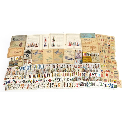 2250 - Collection of cigarette cards and silk tea cards, some arranged in albums, including Will's Cigarett... 