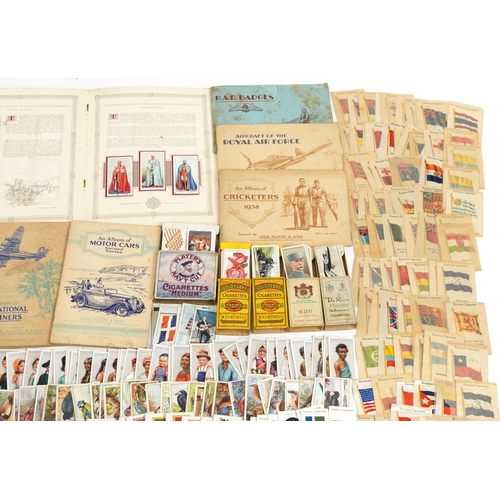 2250 - Collection of cigarette cards and silk tea cards, some arranged in albums, including Will's Cigarett... 