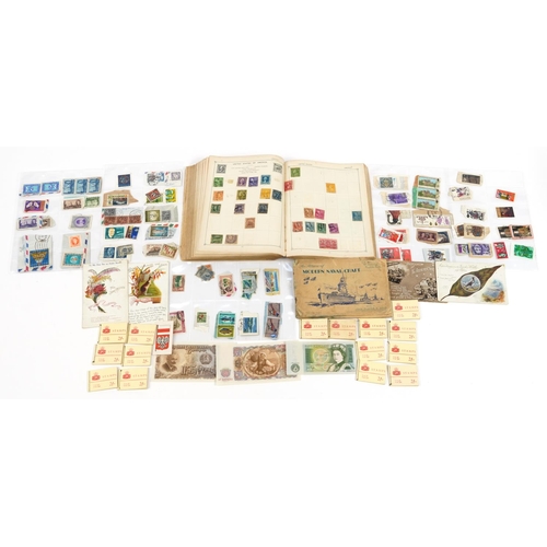 2532 - 19th century and later ephemera including world stamps arranged in an album and cigarette cards