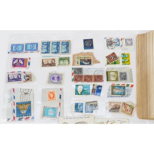 2532 - 19th century and later ephemera including world stamps arranged in an album and cigarette cards