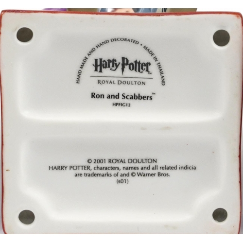 1135 - Four Royal Doulton Harry Potter limited edition collectable figures with boxes, three with certifica... 