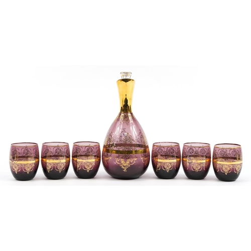 382 - Laguna, Murano glass carafe and six beakers, each with gilt foliate decoration, the decanter with pa... 