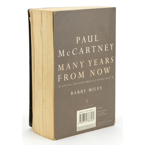 2265 - Paul McCartney Many Years from Now soft back book by Barry Miles, inscribed Best regards Paul McCart... 