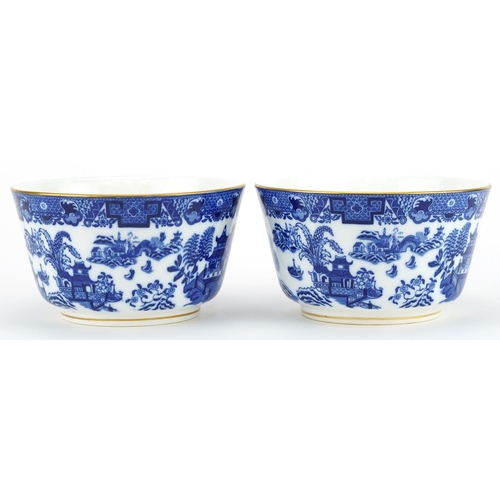 592 - Two Royal Worcester porcelain bowls decorated in the chinoiserie manner, 15cm in diameter