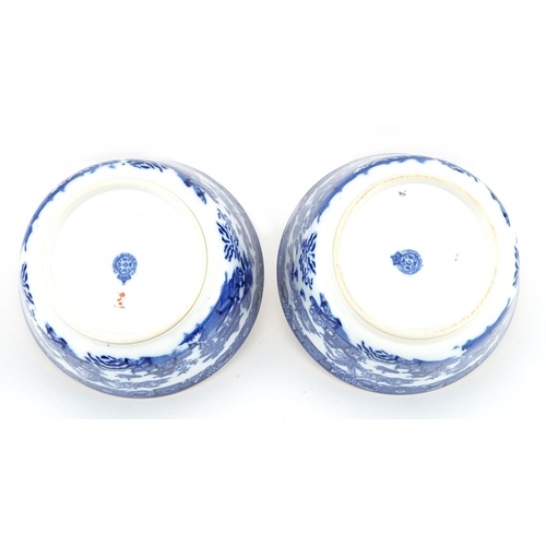 592 - Two Royal Worcester porcelain bowls decorated in the chinoiserie manner, 15cm in diameter