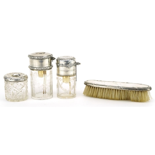 393 - Two French silver mounted etched glass atomisers, silver mounted cut glass tissue jar and silver bac... 