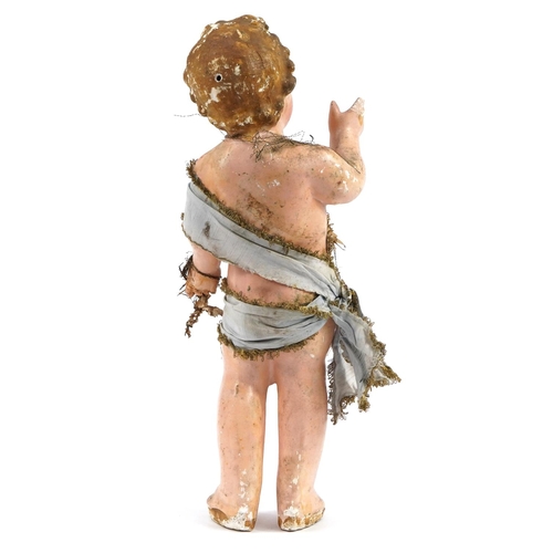 520 - Large hand painted plaster model of a classical cherub, 57.5cm high