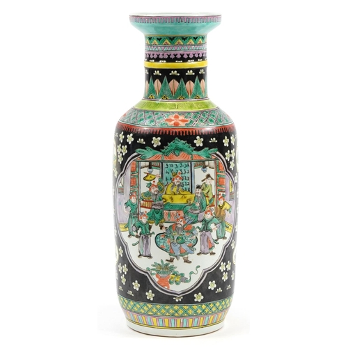 547 - Chinese porcelain black ground rouleau vase hand painted in the famille verte palette with warriors,... 