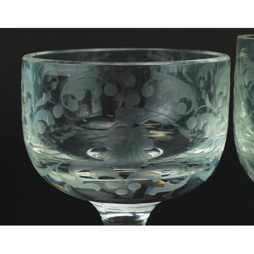 582 - Set of six early 20th century glasses each acid etched with a figure, each 10.5cm high