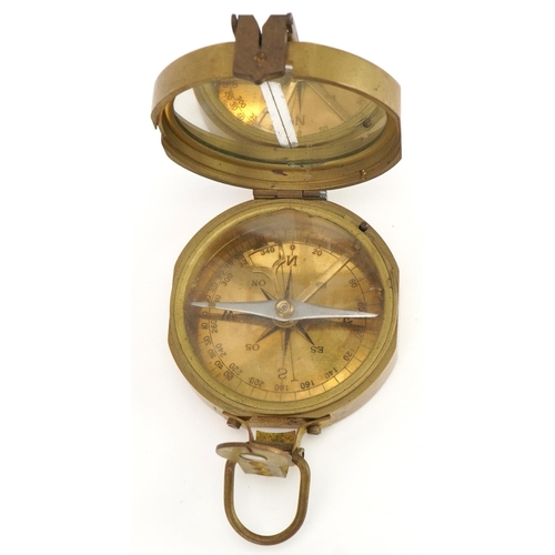 1263A - Military interest brass compass, 9cm in length excluding the suspension loop