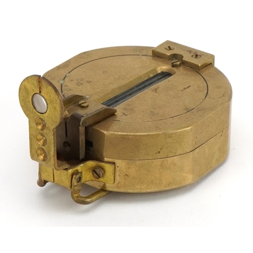 1263A - Military interest brass compass, 9cm in length excluding the suspension loop