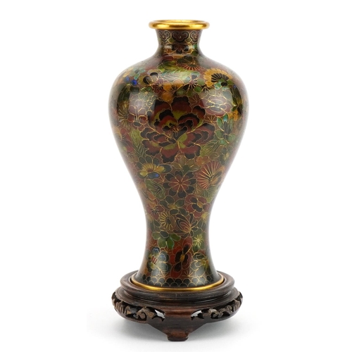 1222 - Chinese cloisonne baluster vase on hardwood stand enamelled with flowers, overall 24cm high