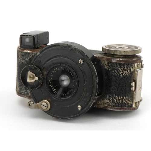 1573 - Early 20th century German Mini Fex miniature camera, 8cm wide