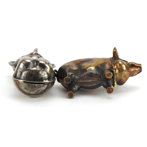 1285 - Novelty brass vesta case in the form of a pig and a silver plated baby's rattle in the form of a cat... 