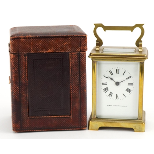 113 - Brass cased carriage clock with fitted travel case, the enamelled dial having Roman numerals, inscri... 