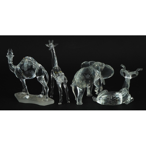 1148 - Four Swarovski Crystal animals comprising camel, giraffe, gazelle and elephant, the largest 13.5cm h... 