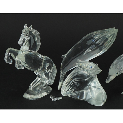 1146 - Four Swarovski Crystal animals comprising unicorn, rearing horse, dolphin with calf and whale with c... 