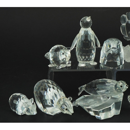 1149 - Ten Swarovski Crystal animals including beaver, seal with pup, penguin, whale and eagle head, the la... 