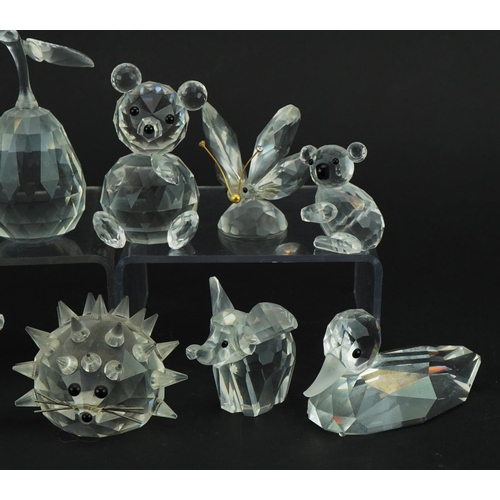 1151 - Ten Swarovski Crystal animals including birds on a bird bath, duck, hedgehog and butterfly, the larg... 