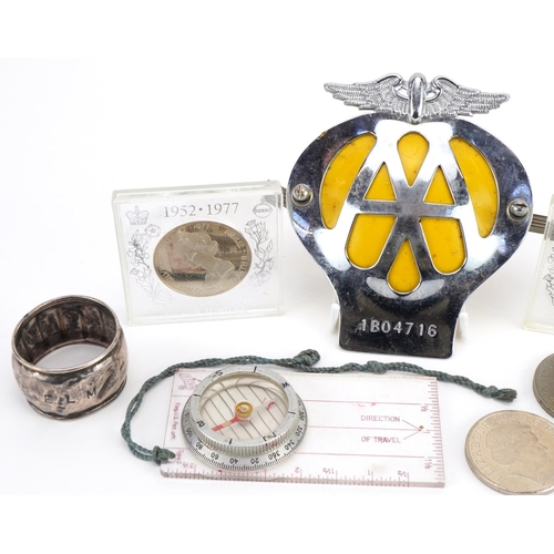 1272 - Objects including five pound coin, AA car badge and two silver napkin rings