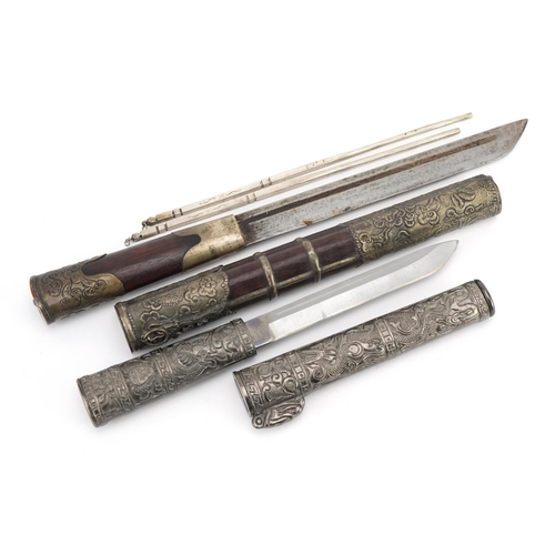 1274 - Two Chinese knives including a hardwood example with white metal mounts, the largest 34cm in length