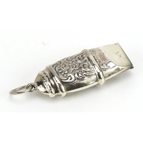 339 - Novelty silver whistle pendant embossed with flowers, 4cm in length, 5.8g