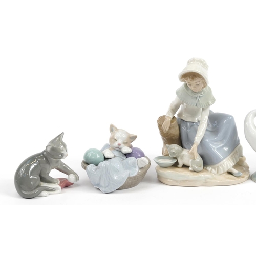 1216 - Lladro and Nao collectable figures and animals including kittens playing, the largest 19.5cm high