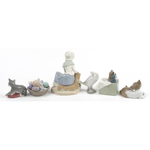 1216 - Lladro and Nao collectable figures and animals including kittens playing, the largest 19.5cm high