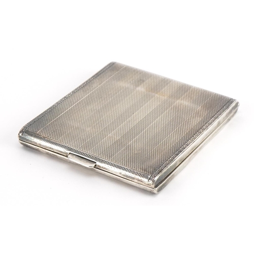 189 - Art Deco rectangular silver cigarette case with engine turned decoration and gilt interior, J H W ma... 