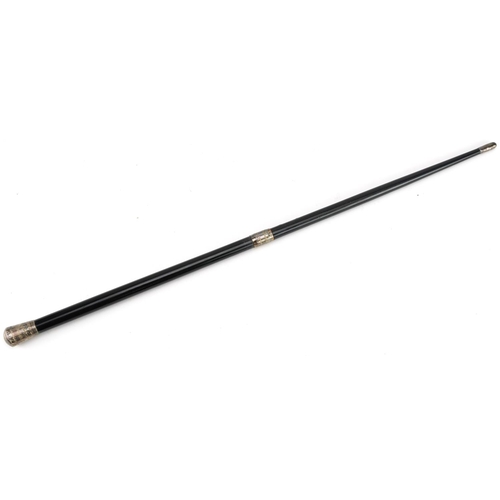 179 - Early 20th century ebonised conductor's baton with engraved silver mounts housed in a velvet and sil... 