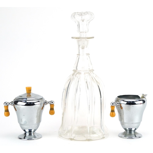 1252 - Continental glass decanter and American chrome plated lidded sugar bowl and milk jug, the largest 34... 