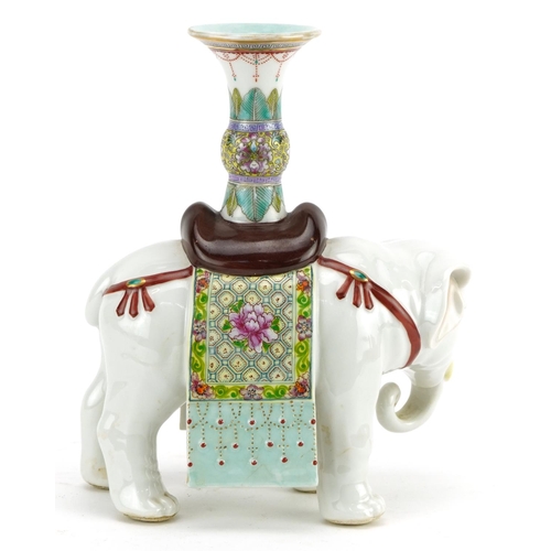 120 - Chinese porcelain candlestick in the form of an elephant, hand painted in the famille rose palette w... 