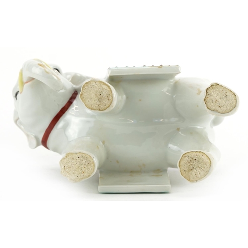 120 - Chinese porcelain candlestick in the form of an elephant, hand painted in the famille rose palette w... 