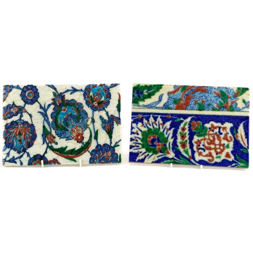 193 - Two Turkish Ottoman Iznik tiles, each hand painted with flowers, each 24cm x 16cm