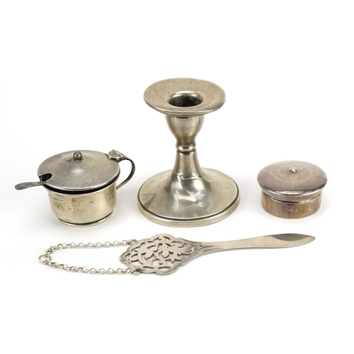 482 - Silver objects comprising circular candlestick, mustard with blue glass liner, circular pillbox and ... 