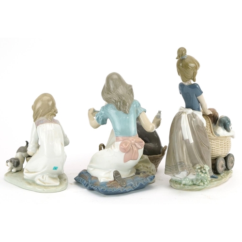 1207 - Three Lladro porcelain figurines comprising Litter of Fun 5364, Take Your Medicine 5921 and Joy in a... 